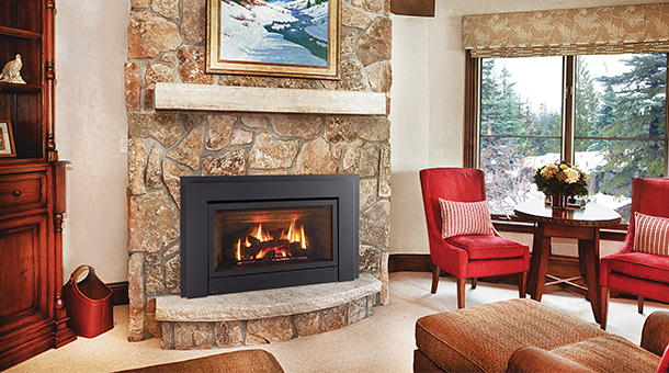 Regency E33 Gas Fireplace Insert with large stone surround 